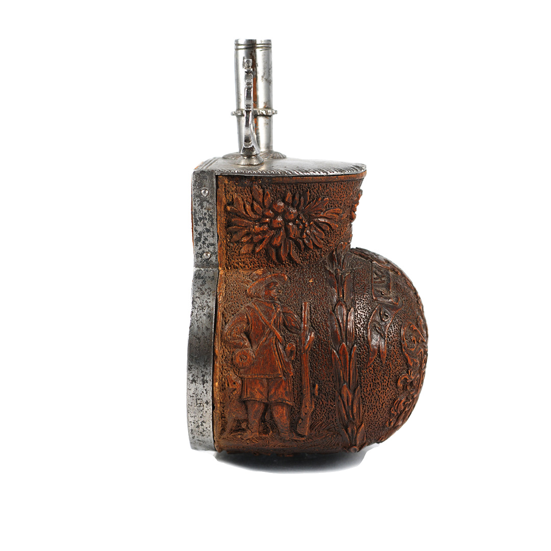 A boxwood powder flask - dated "1656"