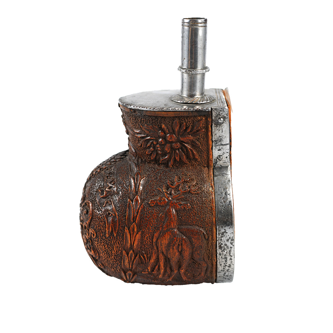 A boxwood powder flask - dated "1656"