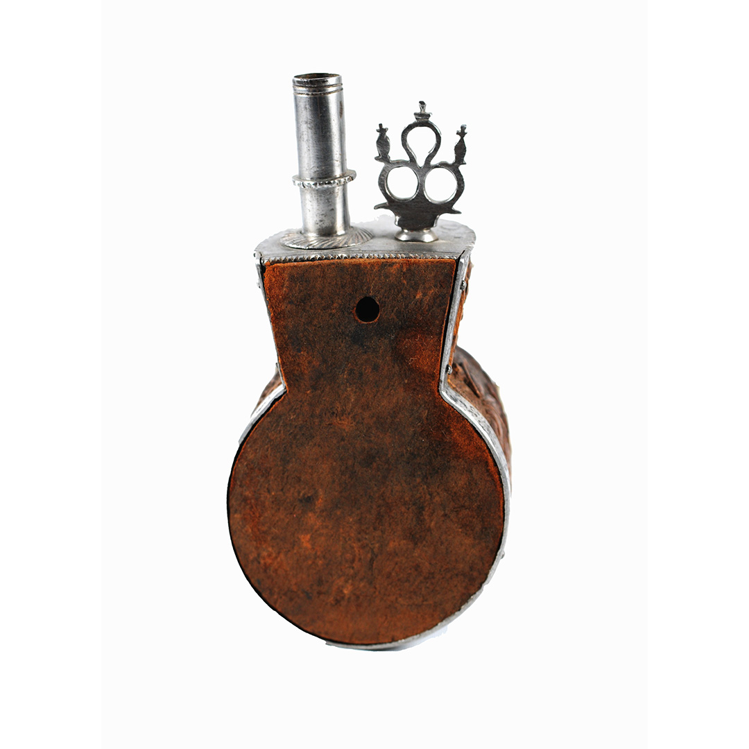 A boxwood powder flask - dated "1656"