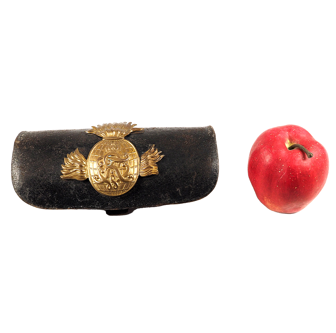 Prussia - Cartridge case for field artillery crews, model 1874 Black lacquered leather case with applied brass fittings. Three-piece flamed grenade with crowned monogram "FRW" (joined).